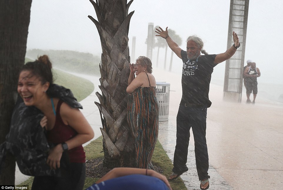 00578-4867972-People_in_Miami_Beach_Florida_ignore_warnings_to_stay_indoors_on-a-4_1504988671556.jpg
