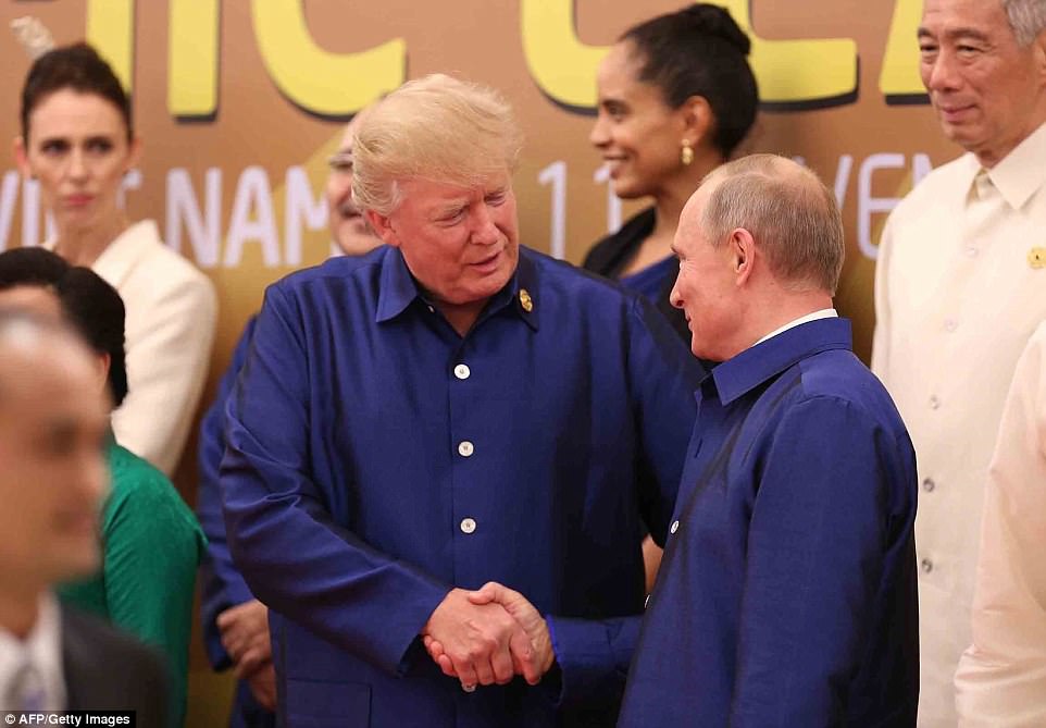 00578-5070243-Donald_Trump_and_Vladimir_Putin_shook_hands_Friday_in_Vietnam_at-a-1_1510331251692.jpg