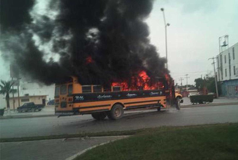 0578-3263226-School_bus_set_on_fire_in_Reynosa_by_cartel_looking_to_kill_chil-a-62_1444236715088.jpg