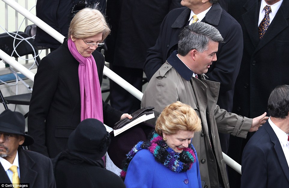 0578-4140152-Senator_Elizabeth_Warren_in_a_pink_scarf_arrives_at_the_Capitol_-a-23_1484937580356.jpg