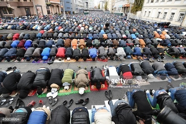456638994-russian-muslims-pray-in-a-street-near-the-gettyimages.jpg