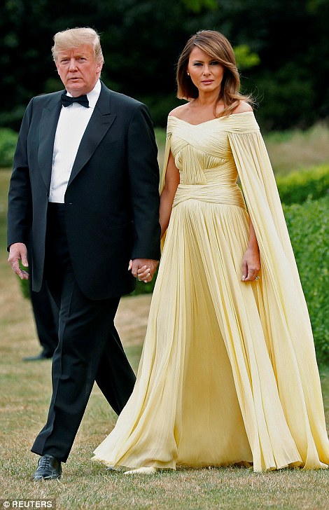 4E2B71DA00000578-5947587-Trump_in_tux_and_Melania_in_her_yellow_dress-a-68_1531420344221.jpg
