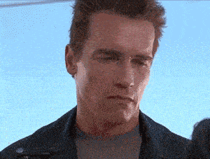 Arnold%20Schwarzenegger%20smiling%20awkwardly.gif