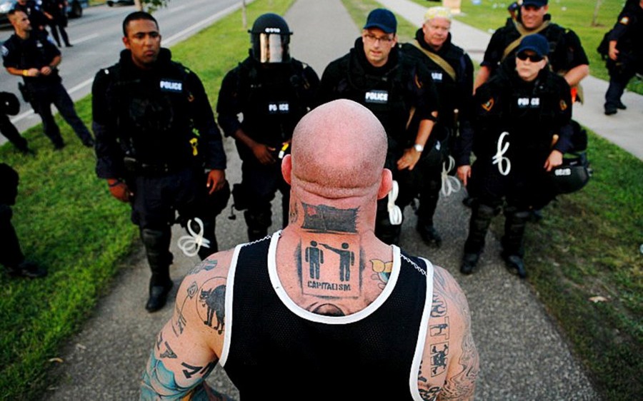 Men-Tattoo-designs-1-vs-police-900x562.jpg