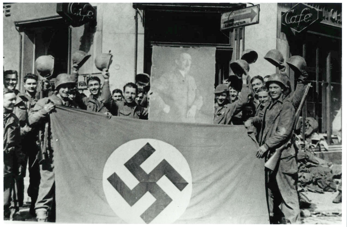 Nazi_flag_and_portrait_of_Hitler._22_Mar_1945.jpg