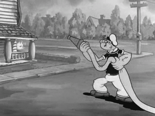 Popeye-Saves-A-Burning-Home-With-a-Hose-His-Mighty-Forearms.gif