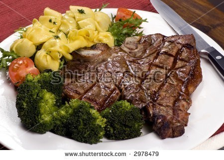 stock-photo-a-mouth-watering-porterhouse-steak-with-fresh-vegetables-and-pasta-2978479.jpg