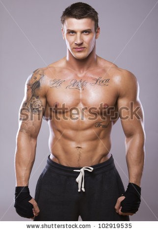 stock-photo-image-of-muscle-man-posing-in-studio-102919535.jpg