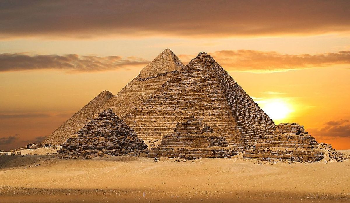 the_pyramids_of_giza_in_egypt_at_sunset_other.jpg