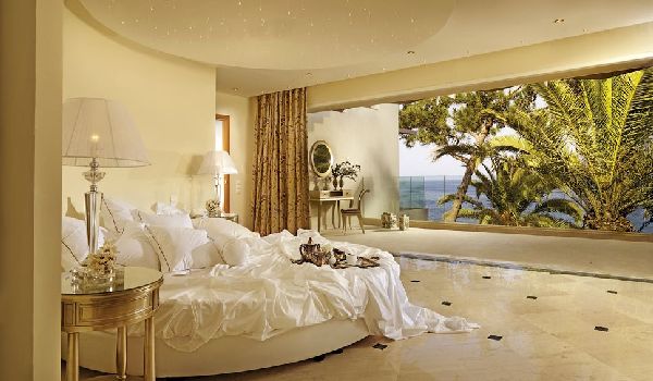 Villa-Emerald-Master-Bedroom-with-Round-Beds-at-Out-of-the-Blue-Capsis-Elite-Resort.jpg