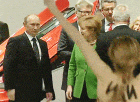 Vladimir-Putin-thumbs-up-approves-naked-girl-protester-14012341620.gif