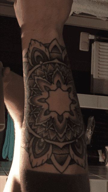 Mandala tattoo forearm